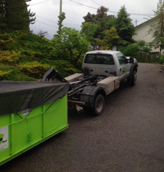sloped surfaces can make roll-off dumpster rental use difficult