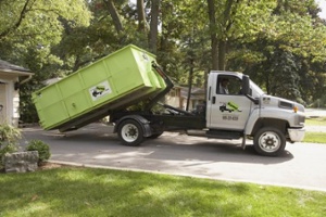 Truck Delivering a Dumpster Rental Clayton Missouri